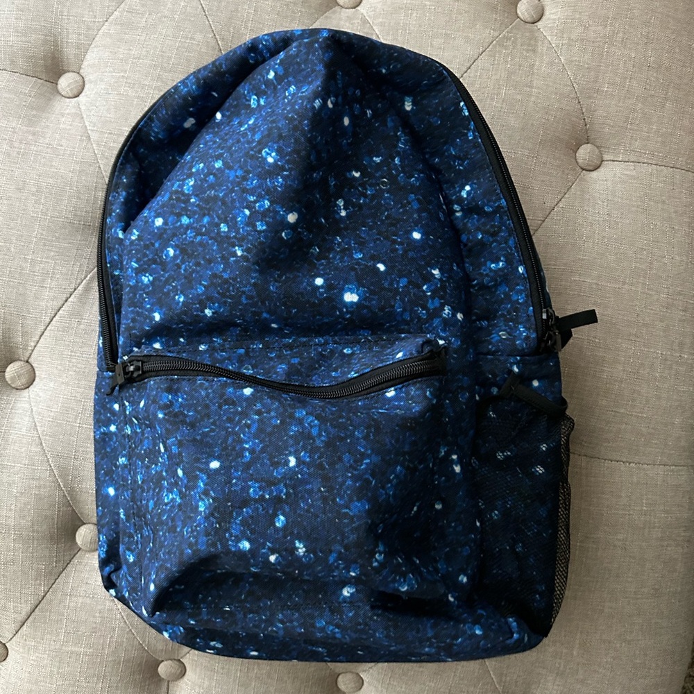 Brand new navy blue sparkle print school backpack.